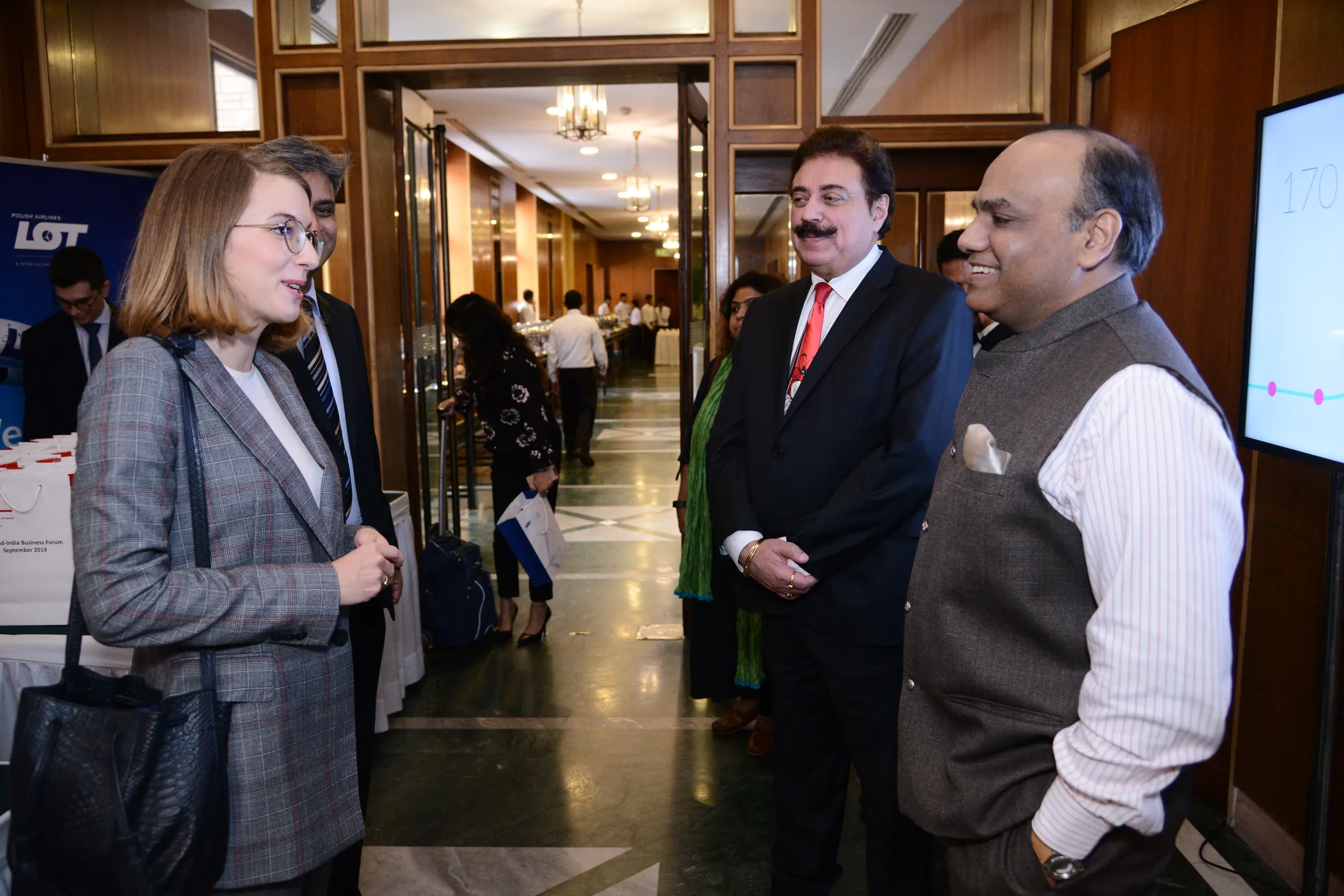 Ada Dyndo in conversation with business representatives