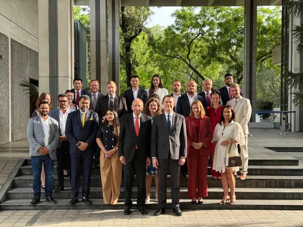 Ada Dyndo with a group of international business delegates